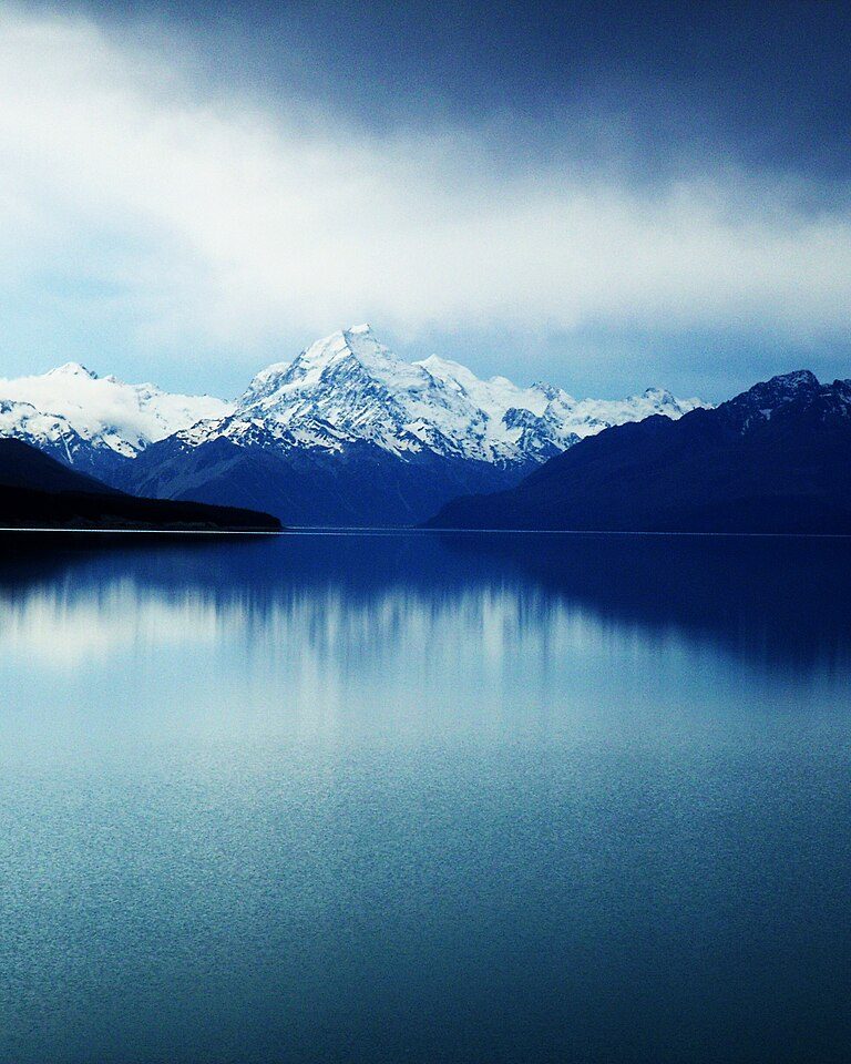 Mount Cook rising above glacial valleys in New Zealand